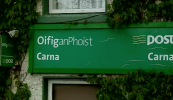 Post le fógairt in Oifig an Phoist Charna agus seirbhísí ar ais ansin go luath