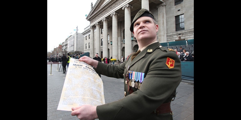 27/3/2016 1916 Easter Rising Centenary Celebrations. Outside the GPO in Dublin today is Com. Pat Kelleher of the Irish Defences Forces (army) with a copy of the The Proclamation of the Republic, on the one hundred year anniversary of the Easter Rising in Dublin. Photo RollingNews.ie