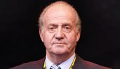 TUAIRISC ÓN SPÁINN: Juan Carlos I ar a theitheadh agus a cháil scriosta