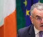 ‘Ní chuirfidh mé m’ainm le spriocdháta nach mbainfear amach’  – cosaint déanta ag aire ar an moill ar spriocanna do sheirbhísí Gaeilge