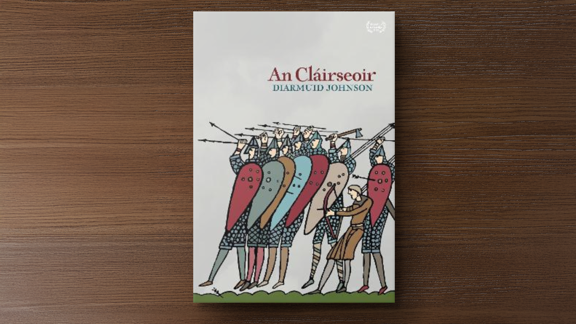 Máistir ar an úrscéal staire ag cur feola ar chnámha annála