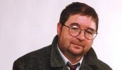 Tost agus faillí na n-údarás i gcás Martin O’Hagan do-mhaite
