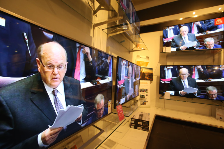 13/10/2015 Fine Gael Minister for Finance Michael Noonan on television at Arnotts Technology department as he delivers the Budget for 2016. Photo: Sam Boal/RollingNews.ie