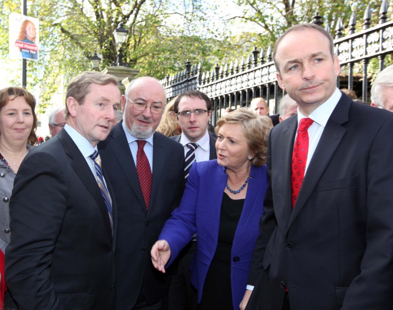 File Photo Enda Kenny and Michael Martin Potential Partners in Government.7/11/2012 Childrens Referendums Campaigns. Taoiseach and Fine Gael leader Enda Kenny with Sinn Fein's Caoimhghin O Caolain(3dr R) Minister for Children Frances Fitzgerald and Fianna Fail party leader Micheal Martin during the launch of the Yes for Childrens Referendun campaign bus at Government Buildings. Photo Leon Farrell/RollingNews.ie