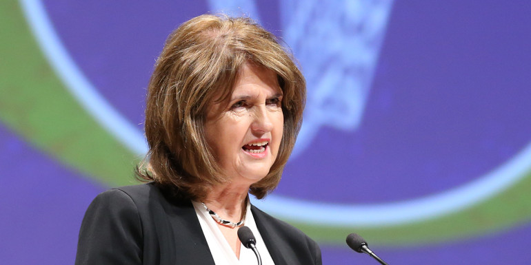 14/12/2015. Tanaiste and Labour Party Minister for Social Protection Joan Burton speaking at the first ceremony today in Convention Centre Dublin. 4 Citizenship Ceremonies be held in the Convention Centre Dublin with some 3,350 candidates originating from over 120 countries to attend today in Convention Centre Dublin. Photo: RollingNews.ie