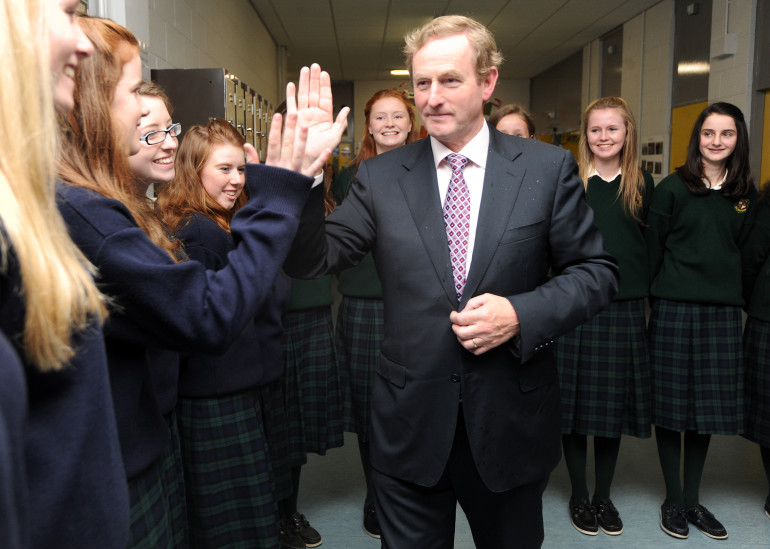 11/10/2012. Taoiseach opens new extension at Loreto Balbriggan. Taoiseach and Fine Gael leader Enda Kenny 'high fives' pupils at the opening of a new extension at Loreto Secondary School in Balbriggan this afternoon. Photo: Laura Hutton/RollingNews.ie