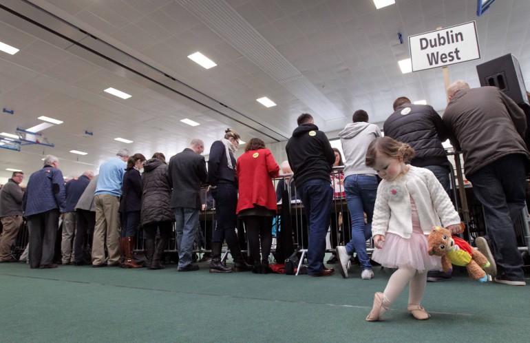 27/2/2016. General Election 2016 - Counting of Votes. Scenes from the counting of votes for the Dublin West Constituency, at the Phibblestown Communmity Hall Count Centre in Blanchardstown, Dublin. Photo shows two-year-old Isabel Power from Clonsilla taking in the count after finishing ballet class. Photo: RollingNews.ie