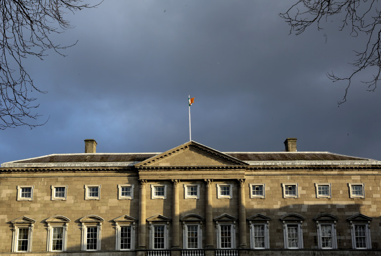 30/01/2014. Dublin Scenes - Weather. Pictured dark clouds appear over Leinster house in Dublin this afternoon. Met Eireann issued a weather warning for the comming weekend. Photo: Sam Boal/RollingNews.ie