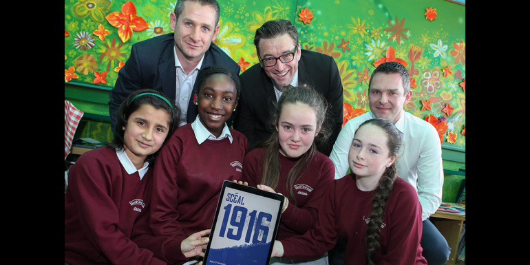 The story of the 1916 Rising in Dublin is told in two new multi-touch books Scéal 1916 & The Story of 1916 produced by NUI Galway as part of the Ireland 2016 Centenary Programme. Pictured with school students Ursula, Beulah, Bella and Mary at the launch today at Scoil Chroí Íosa Galway City (l-r) Seán Ó Grádaigh, author and School of Education, NUI Galway; John Concannon, Director Ireland 2016; and school Principal Colin Barry. Photograph by Aengus McMahon